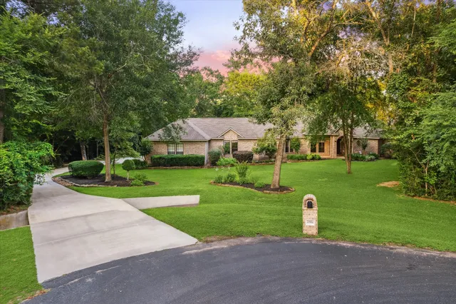a view of a house with a park