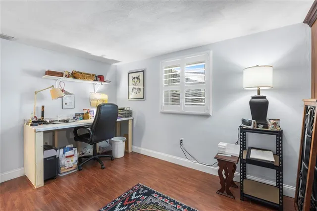 a workspace with furniture hardwood and a workspace