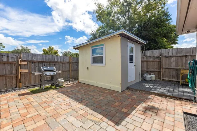 a view of a wooden deck with a patio