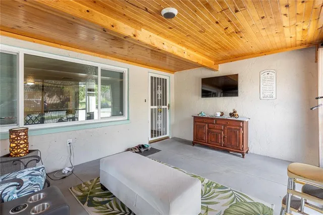 a front view of a house with a yard patio and fire pit