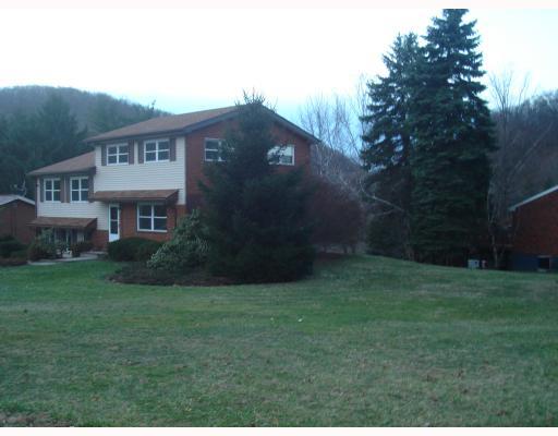 126 Matterhorn Road Monroeville, PA 15146 - Photo 16 of 18 Exterior Front. The spacious yard is on a corner lot