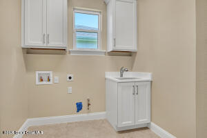 4335 Negal Circle Melbourne, FL 32901 - Photo 14 of 21 Laundry