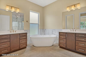 4335 Negal Circle Melbourne, FL 32901 - Photo 16 of 21 Primary Bath with Soaker Tub