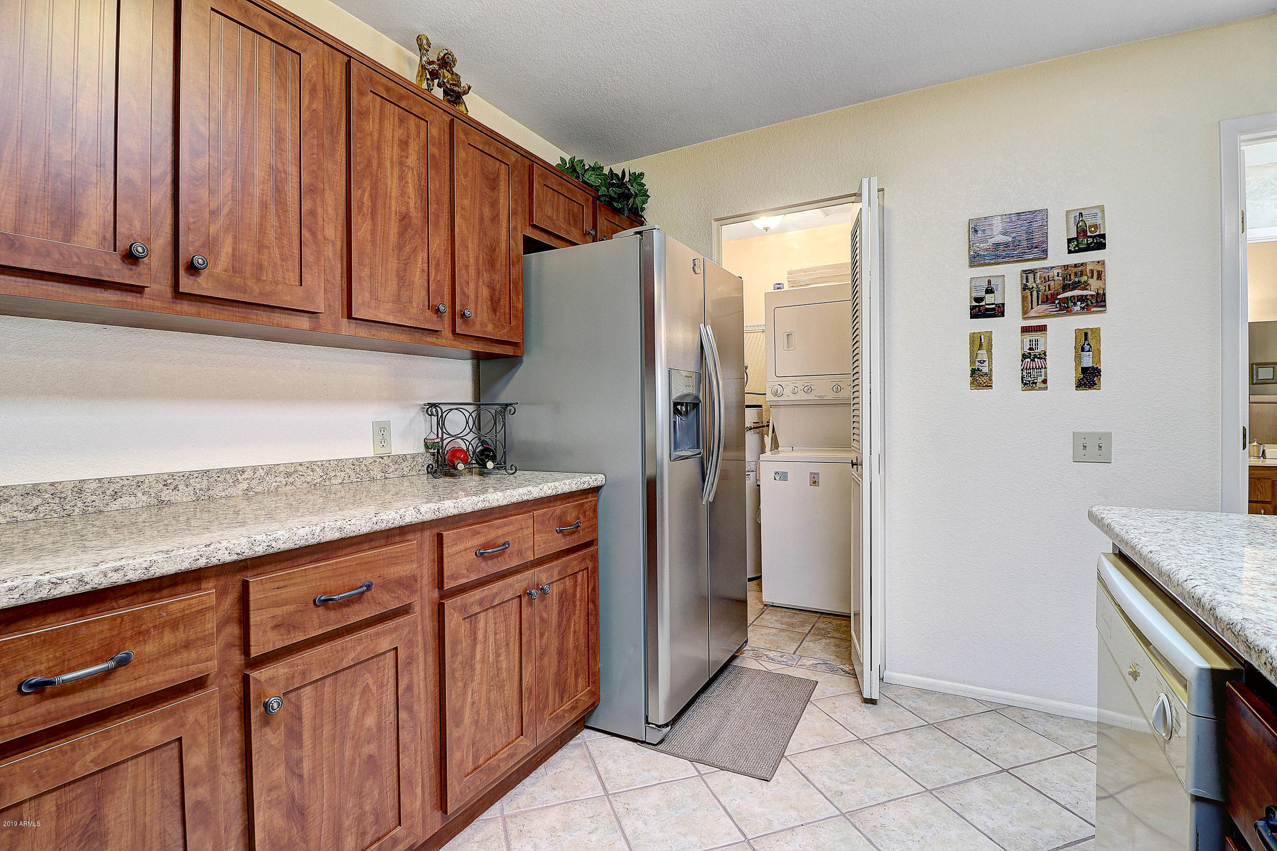14300 West Bell Road, Unit 442 Surprise, AZ 85374 - Photo 11 of 44 Kitchen To Laundry Room View