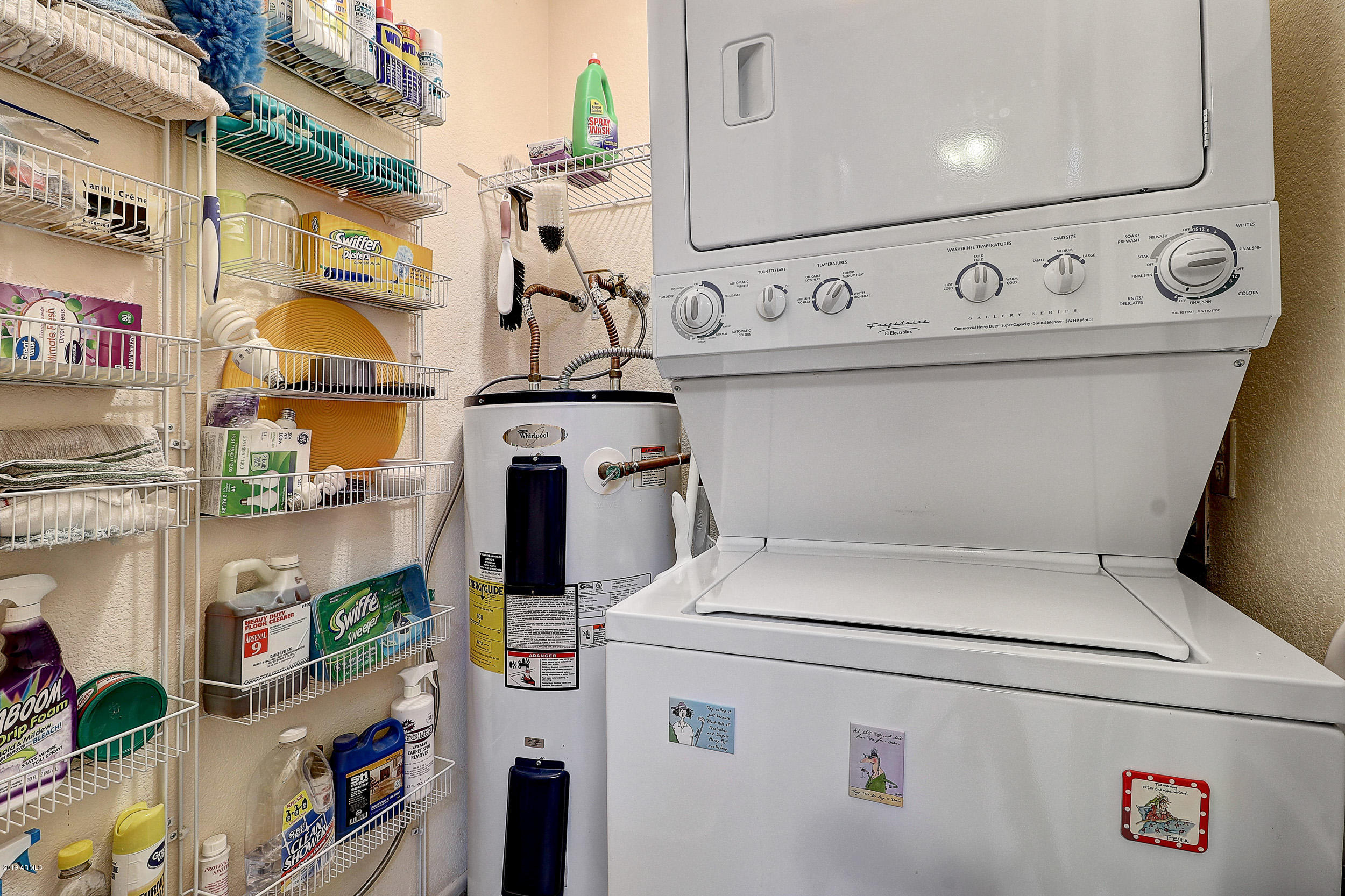 14300 West Bell Road, Unit 442 Surprise, AZ 85374 - Photo 12 of 44 Stacked Washer/Dryer & Storage Shelves/