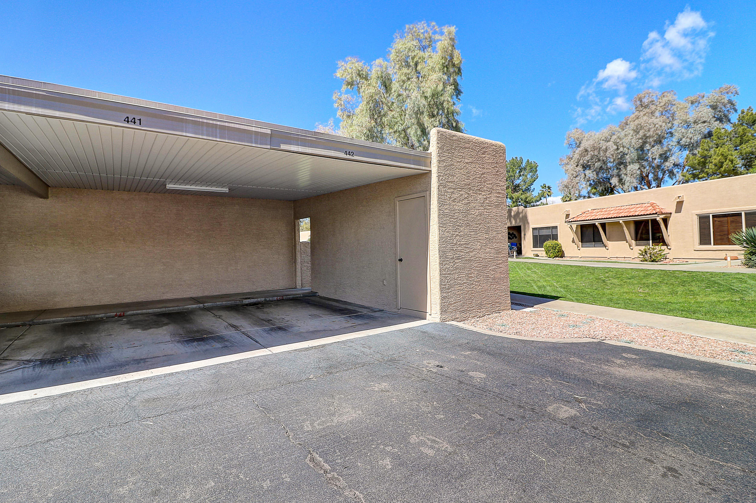 14300 West Bell Road, Unit 442 Surprise, AZ 85374 - Photo 25 of 44 Cover Parking & Storage Room