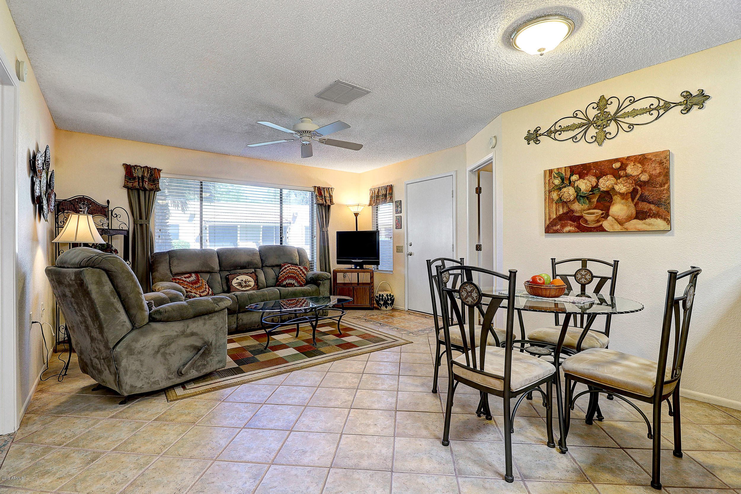 14300 West Bell Road, Unit 442 Surprise, AZ 85374 - Photo 8 of 44 Dining Room & Living Room