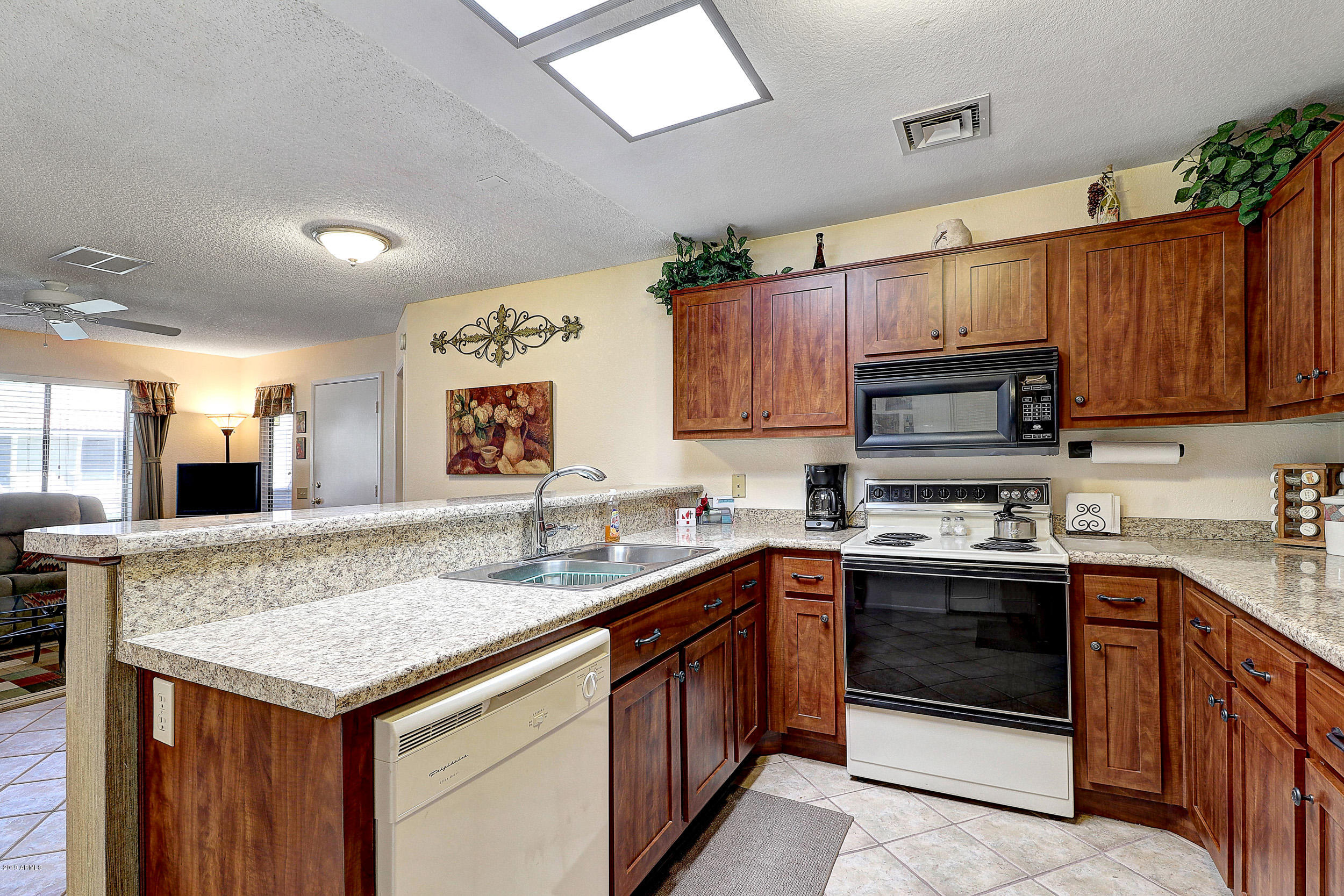 14300 West Bell Road, Unit 442 Surprise, AZ 85374 - Photo 10 of 44 Kitchen Cabinets and Counters View 2