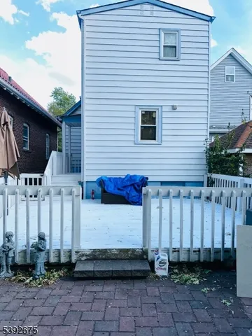 a view of deck space with deck and yard