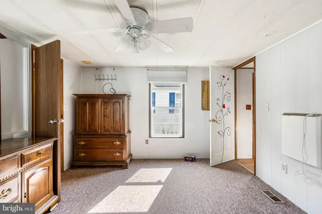 a view of an entryway with front door