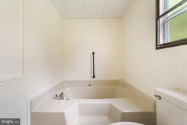 a bathroom with a bathtub