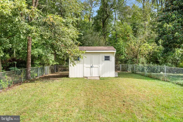 a view of a small space in a yard with swimming pool