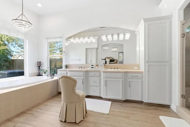 an aerial view of residential houses with outdoor space