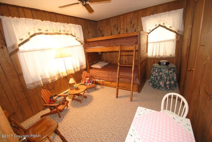 214 Elk Run Road Pocono Lake, PA 18347 - Photo 19 of 26 a view of a room with gym equipment