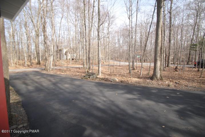 214 Elk Run Road Pocono Lake, PA 18347 - Photo 24 of 26 a view of empty room with wooden fence