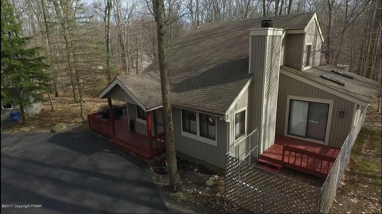 214 Elk Run Road Pocono Lake, PA 18347 - Photo 25 of 26 a view of a house with a yard