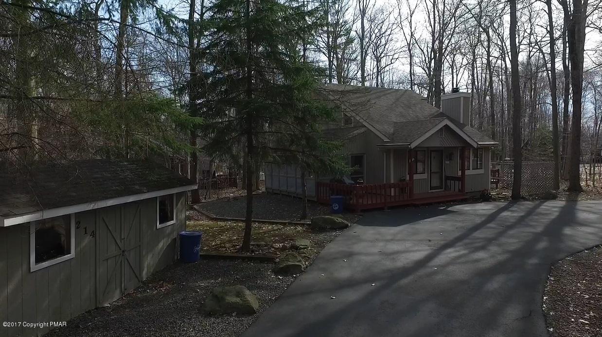 214 Elk Run Road Pocono Lake, PA 18347 - Photo 26 of 26 a view of a house with backyard and trees