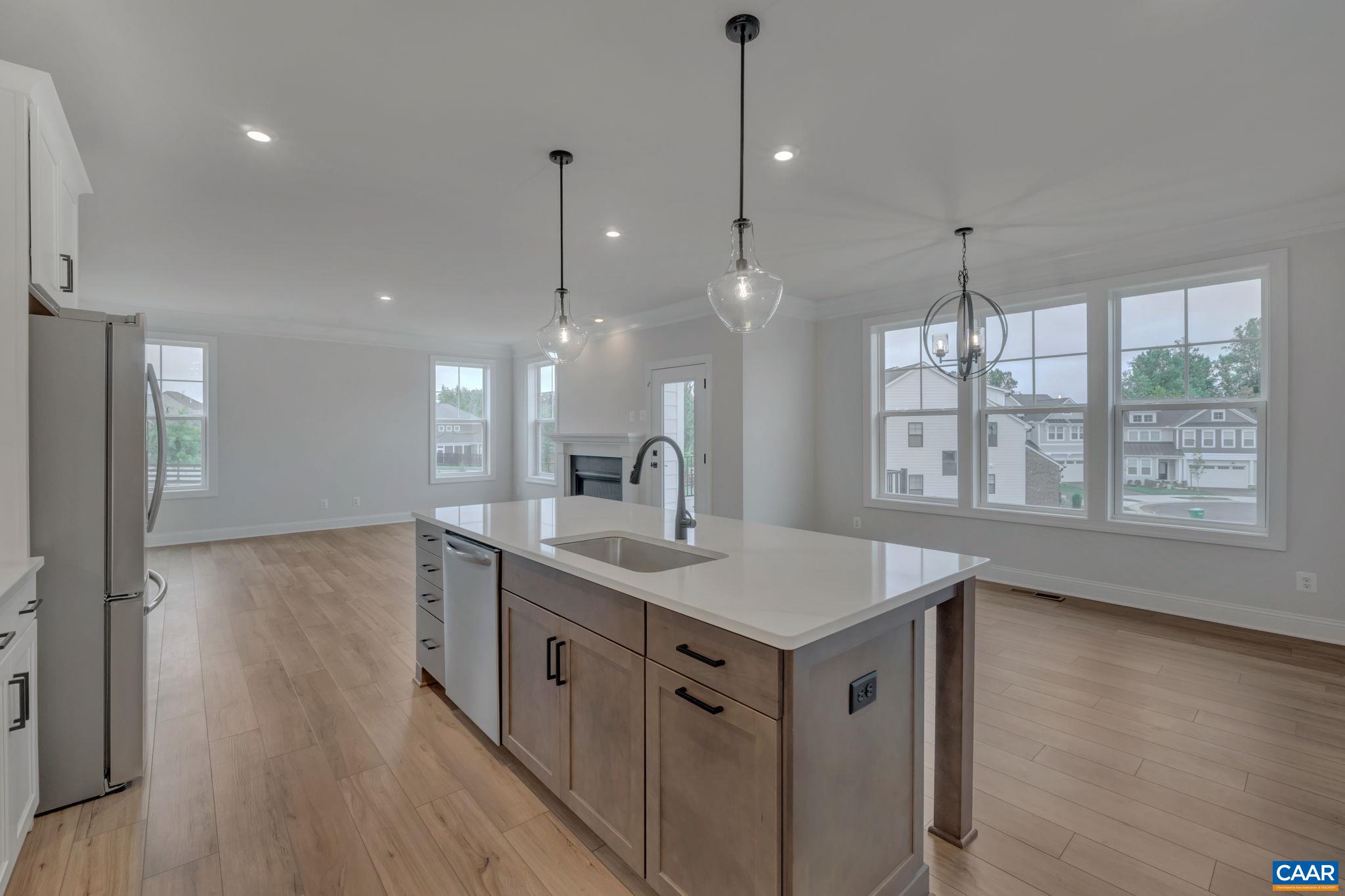 62 B Springdale Road Waynesboro, VA 22980 - Photo 21 of 56 a kitchen with a sink chandelier and wooden floor