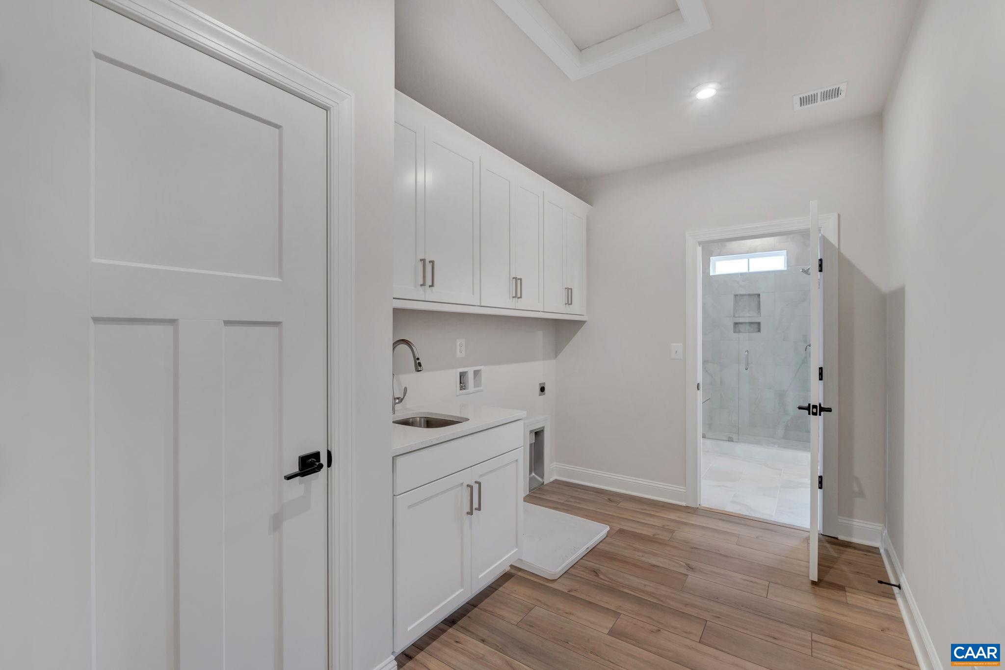 62 B Springdale Road Waynesboro, VA 22980 - Photo 34 of 56 a view of a kitchen with white cabinets