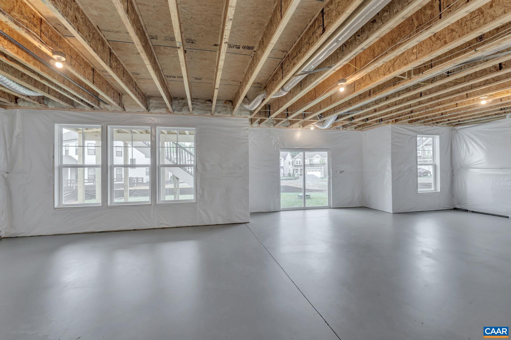62 B Springdale Road Waynesboro, VA 22980 - Photo 45 of 56 a view of an empty room with wooden floor and a window