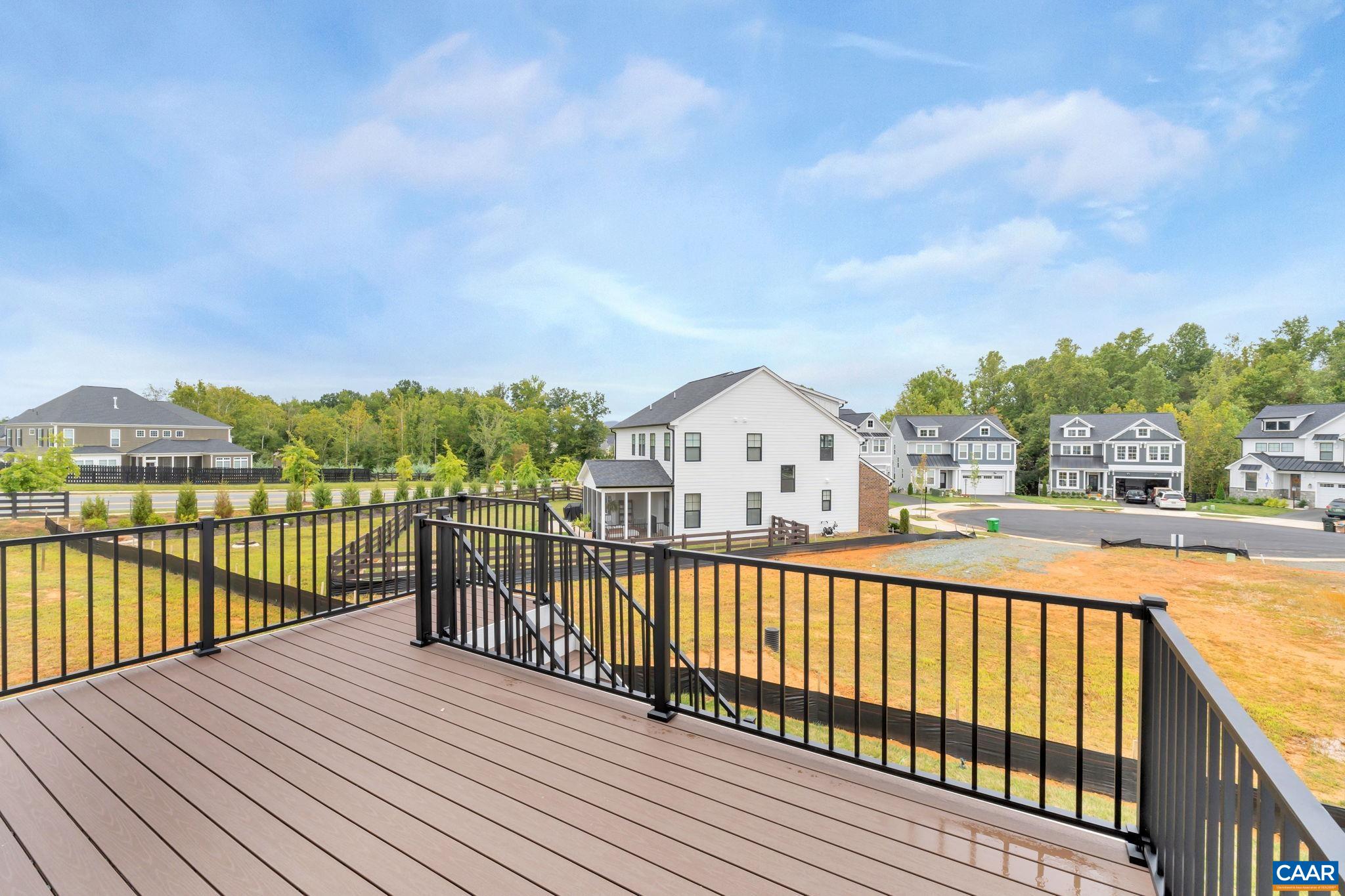 62 B Springdale Road Waynesboro, VA 22980 - Photo 50 of 56 a view of a balcony with wooden floor and city view