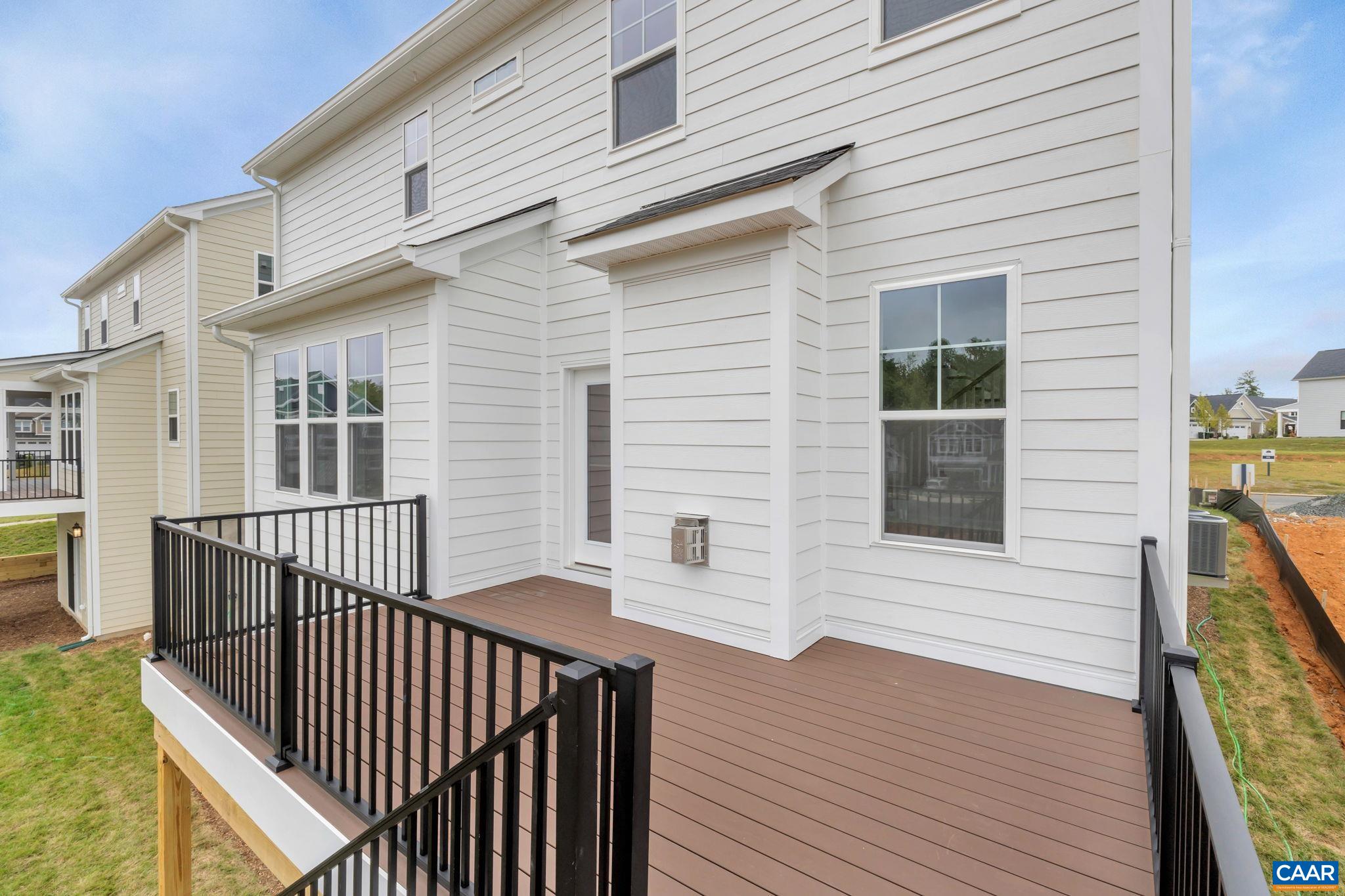 62 B Springdale Road Waynesboro, VA 22980 - Photo 52 of 56 a view of staircase with a large window and wooden floor