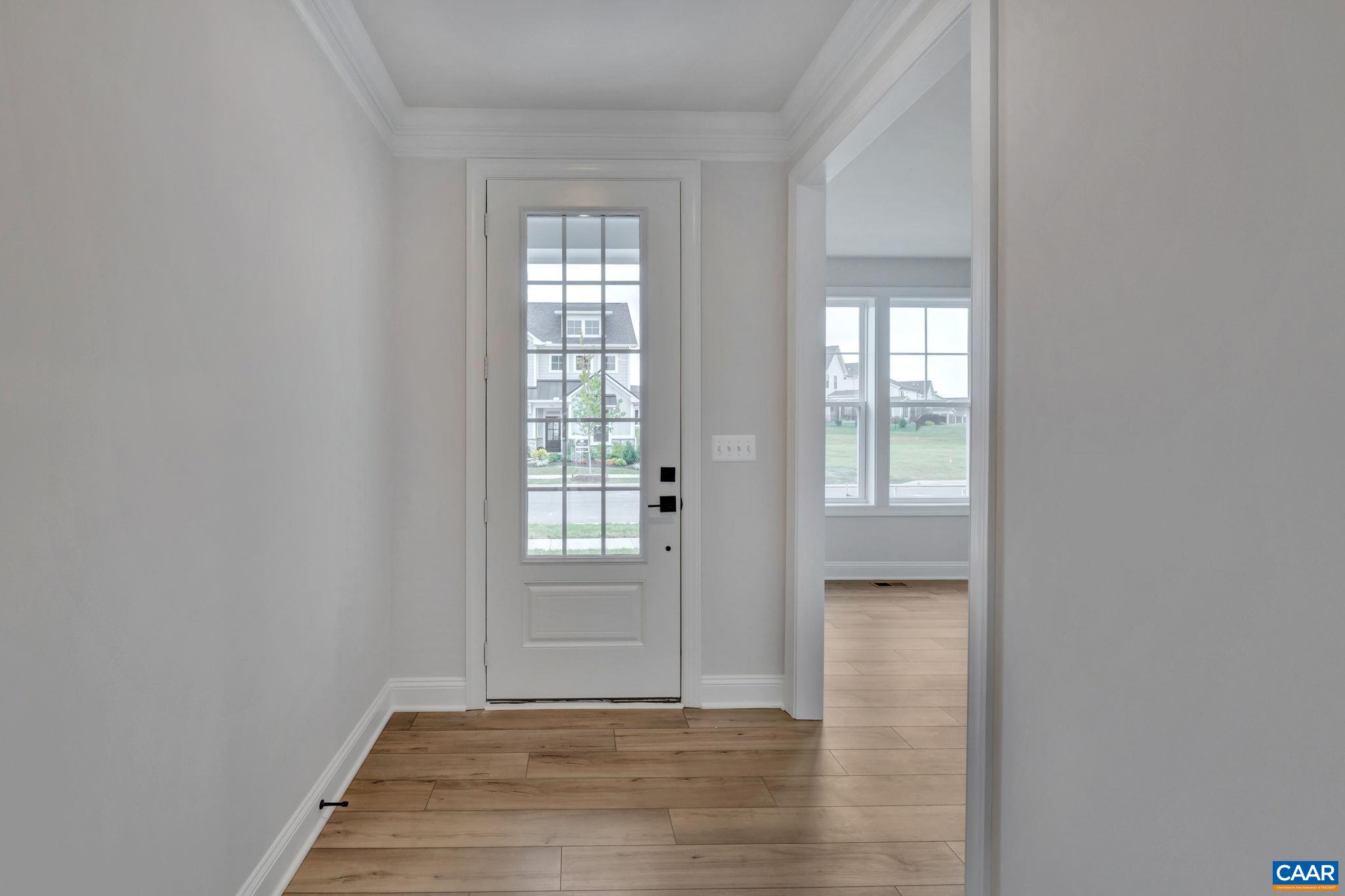 62 B Springdale Road Waynesboro, VA 22980 - Photo 7 of 56 an empty room with wooden floor and windows