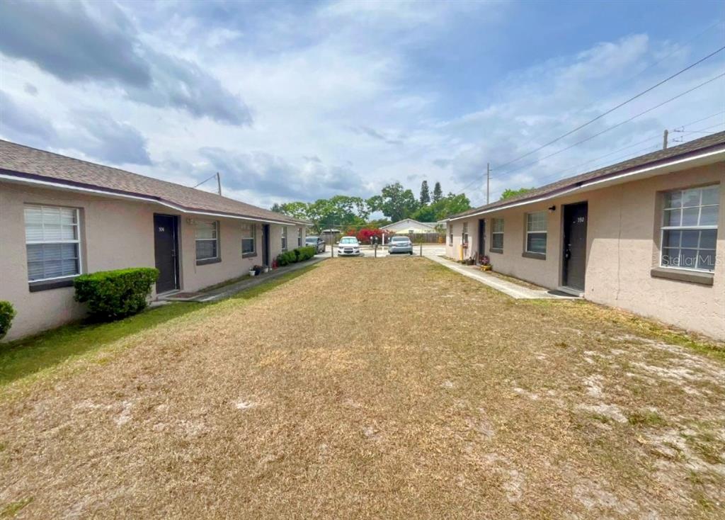 594 Hatfield Road Winter Haven, FL 33880 - Photo 1 of 1 a view of a house with backyard and roof