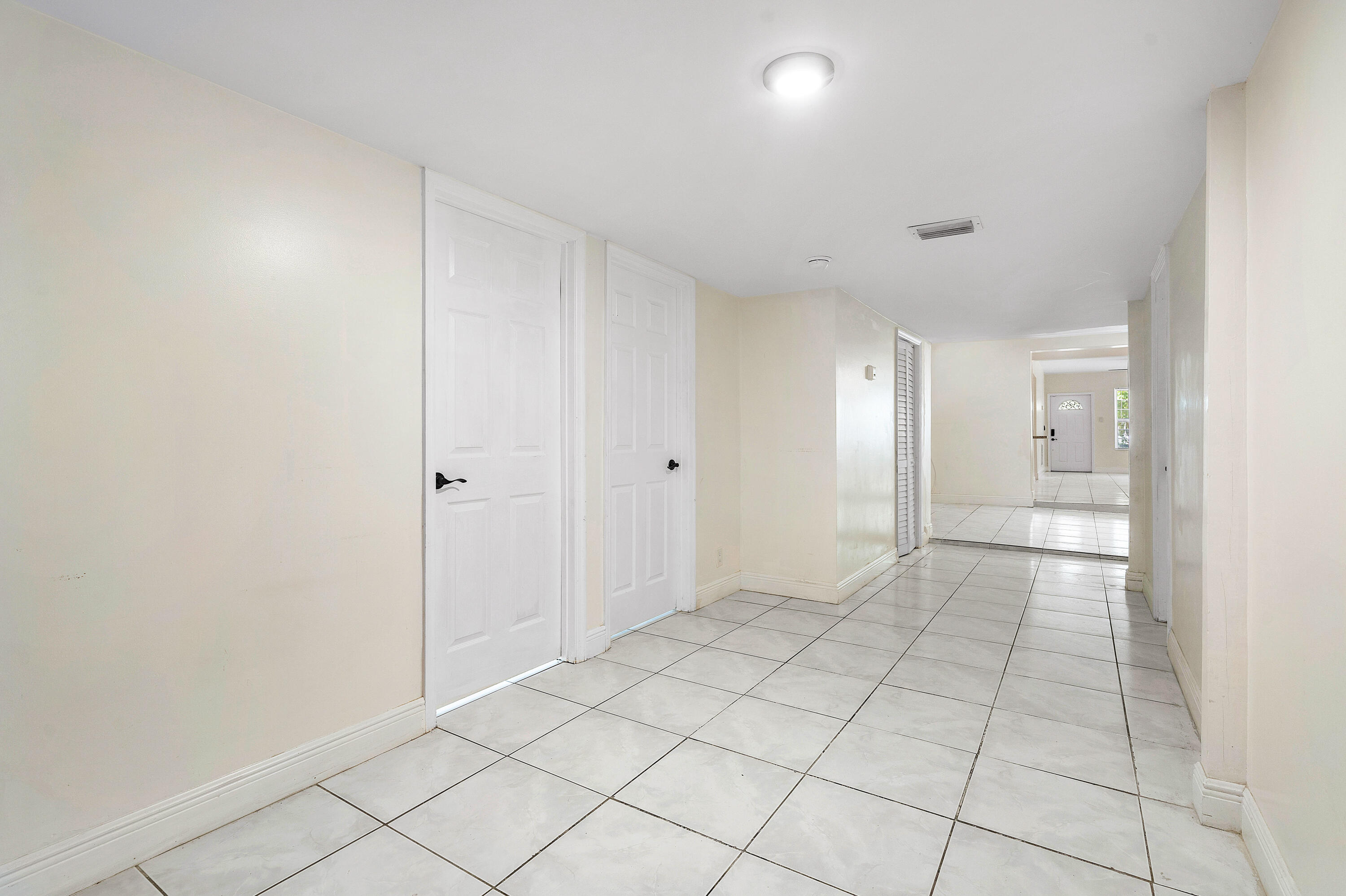 6130 Edwards Road Margate, FL 33063 - Photo 8 of 17 a view of an empty room and window