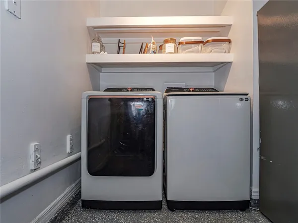 a close view of a stove in a white room
