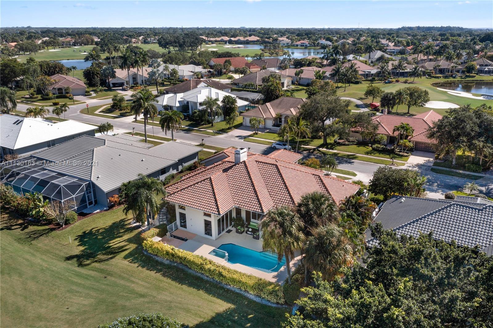 10454 Stonebridge Boulevard Boca Raton, FL 33498 - Photo 36 of 37 an aerial view of residential houses with outdoor space