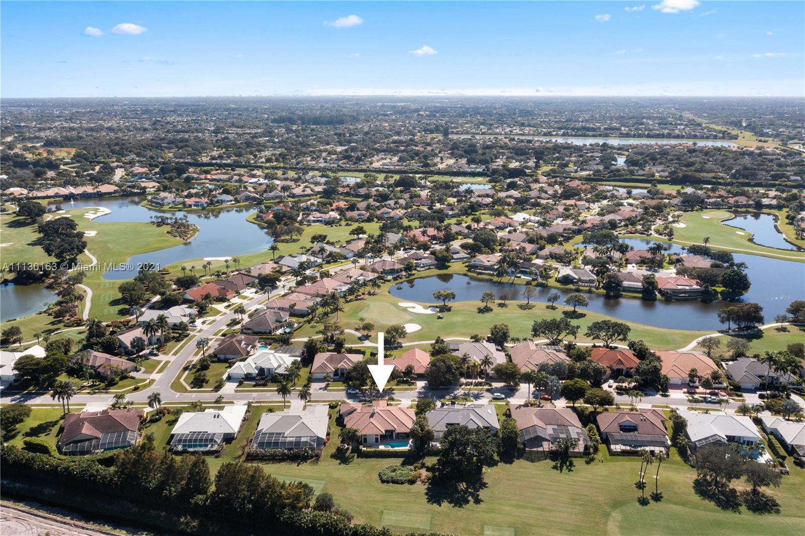 10454 Stonebridge Boulevard Boca Raton, FL 33498 - Photo 8 of 37 an aerial view of residential houses with outdoor space and lake view