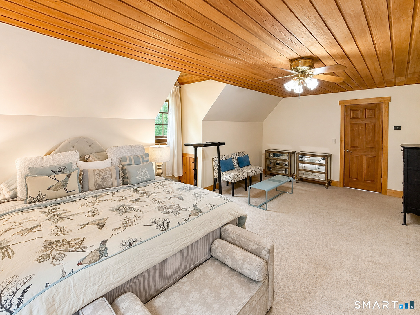 44 Pine Road Colebrook, CT 06021 - Photo 29 of 40 a bedroom with a bed and a chandelier