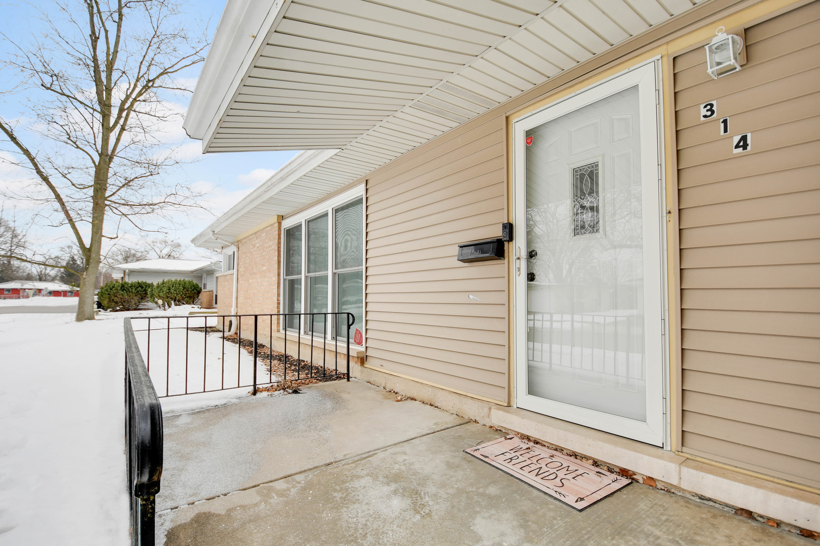 314 Windsor Street Park Forest, IL 60466 - Photo 2 of 20 a view of a porch with a bench