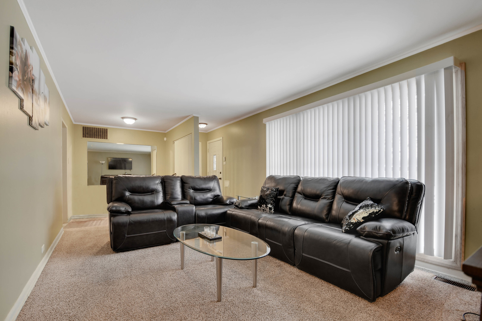 314 Windsor Street Park Forest, IL 60466 - Photo 3 of 20 a living room with furniture and a large window