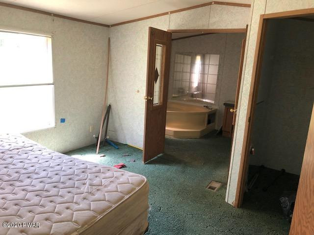 213 Slish Road Honesdale, PA 18431 - Photo 10 of 13 a bathroom with a sink and a mirror