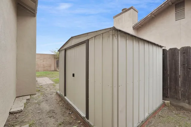 a view of a backyard with garden