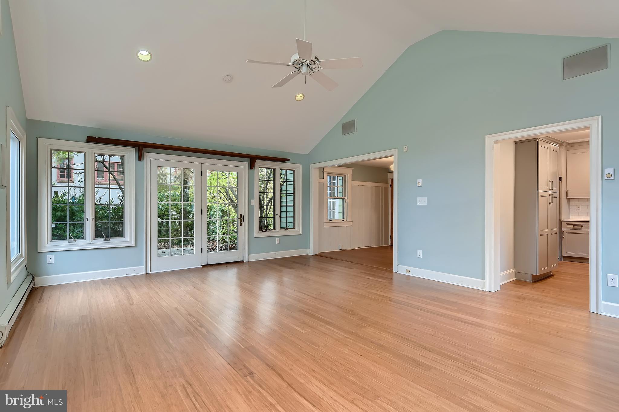 5003 Falls Rd Terrace Baltimore, MD 21210 - Photo 14 of 28 New bamboo floors. Doors lead to deck