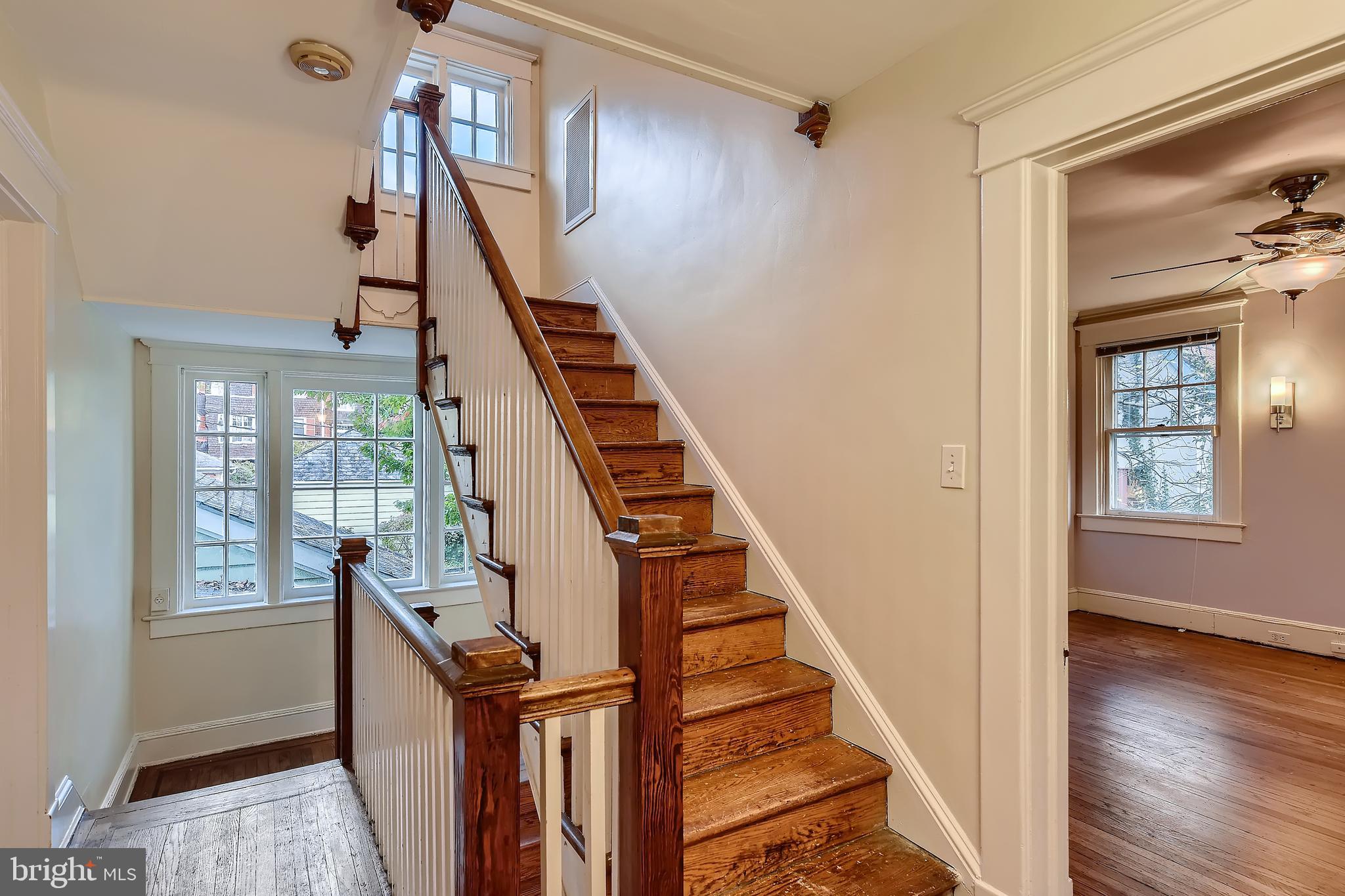 5003 Falls Rd Terrace Baltimore, MD 21210 - Photo 22 of 28 Striking landing window and stairs to 3rd Floor