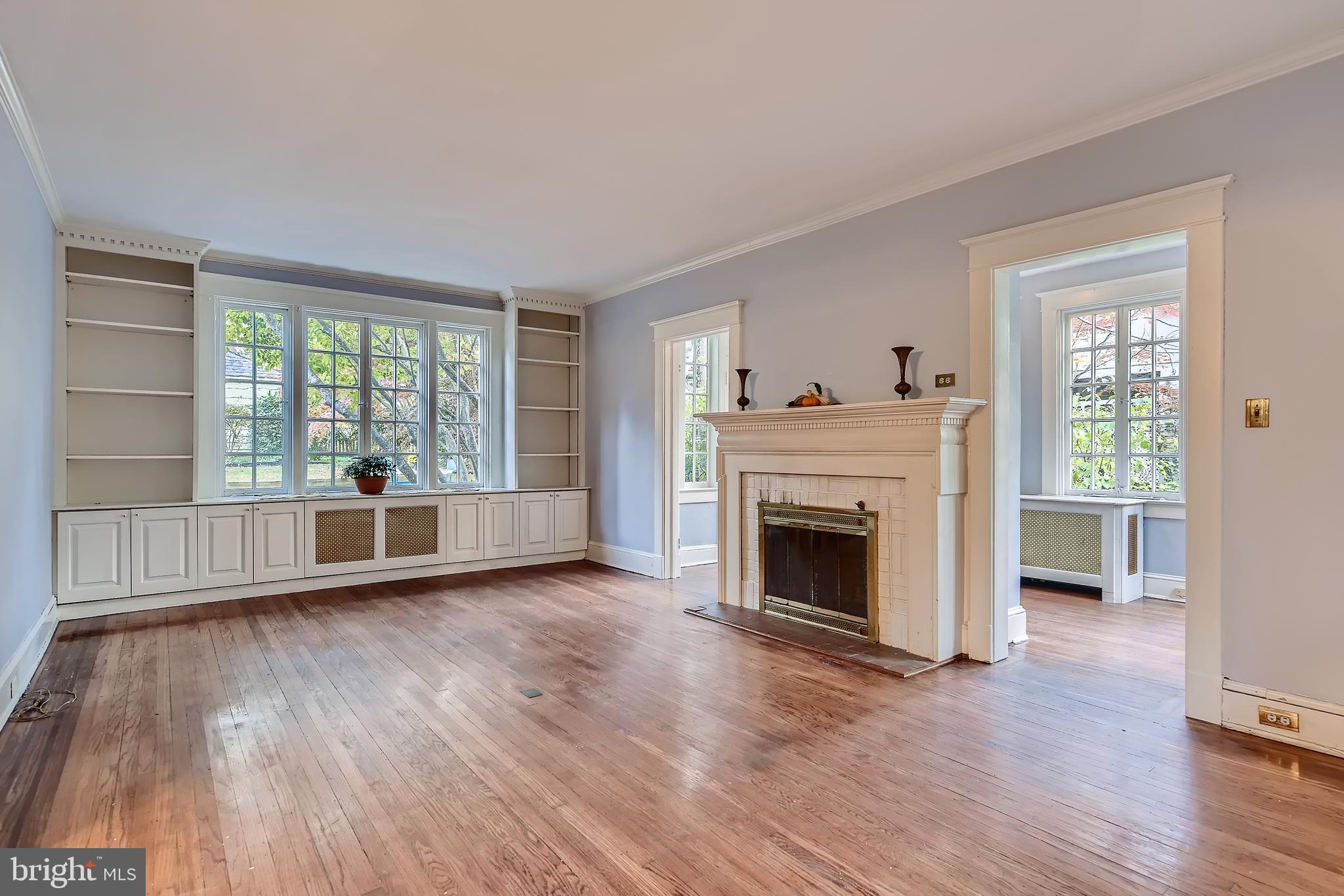 5003 Falls Rd Terrace Baltimore, MD 21210 - Photo 5 of 28 Living Room with fireplace and built-ins