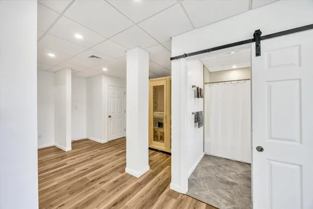 a view of a bathroom with a sink and a shower
