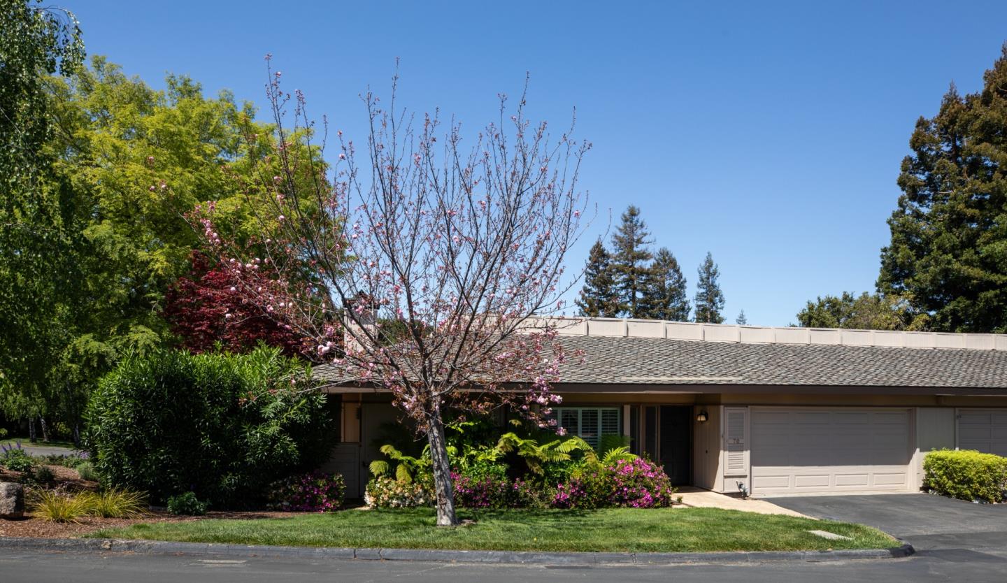 70 Bay Tree Lane Los Altos, CA 94022 - Photo 2 of 37 a front view of a house with garden
