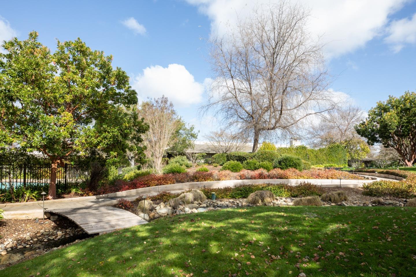 70 Bay Tree Lane Los Altos, CA 94022 - Photo 31 of 37 a view of dirt field with trees around