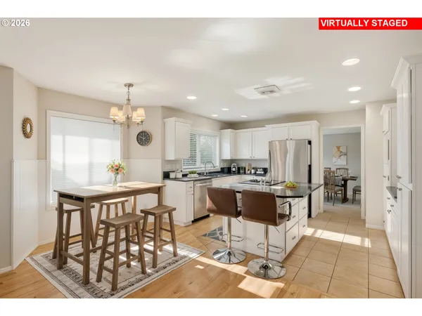 a view of a dining room with furniture