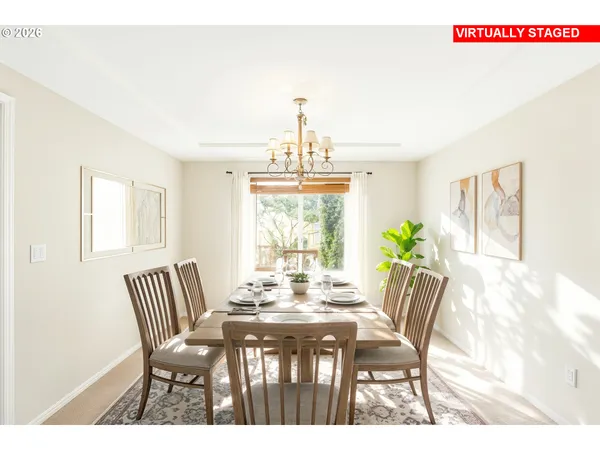 a view of a dining room with furniture window and outside view