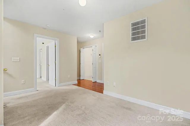 a view of a room with a large window