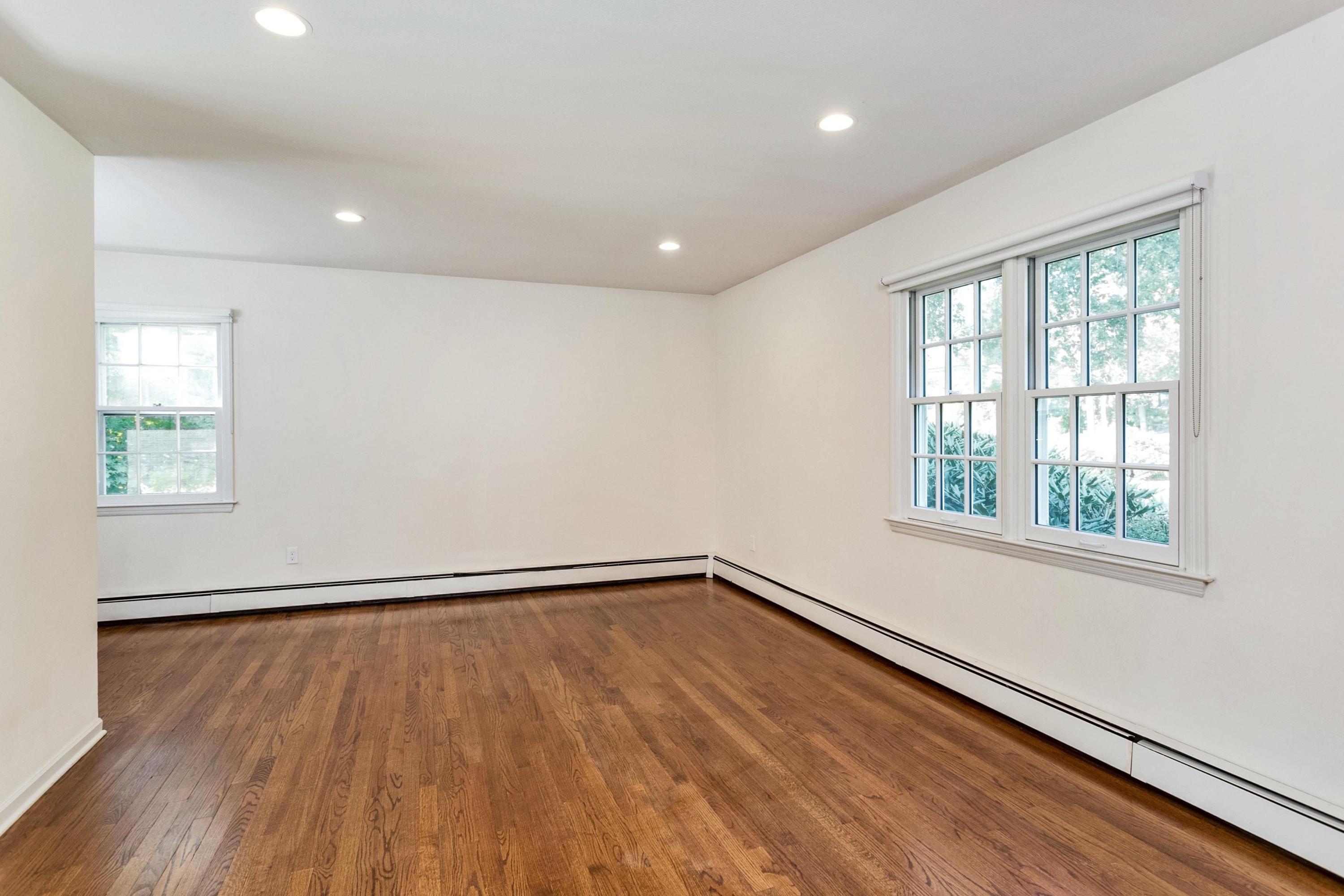 1 Wilson Ridge Road Darien, CT 06820 - Photo 13 of 22 a view of an empty room with wooden floor and a window