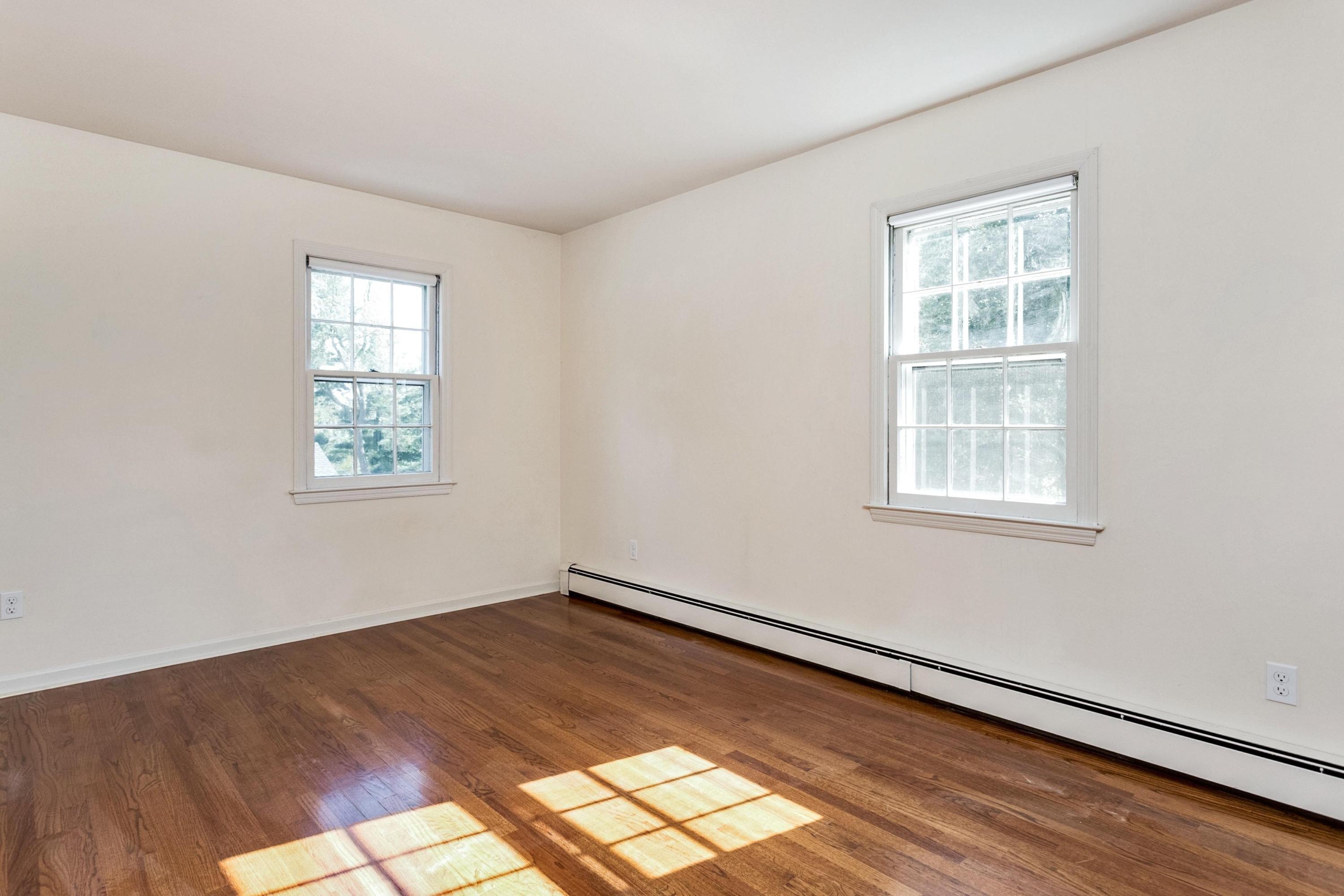 1 Wilson Ridge Road Darien, CT 06820 - Photo 16 of 22 wooden floor in an empty room with a window