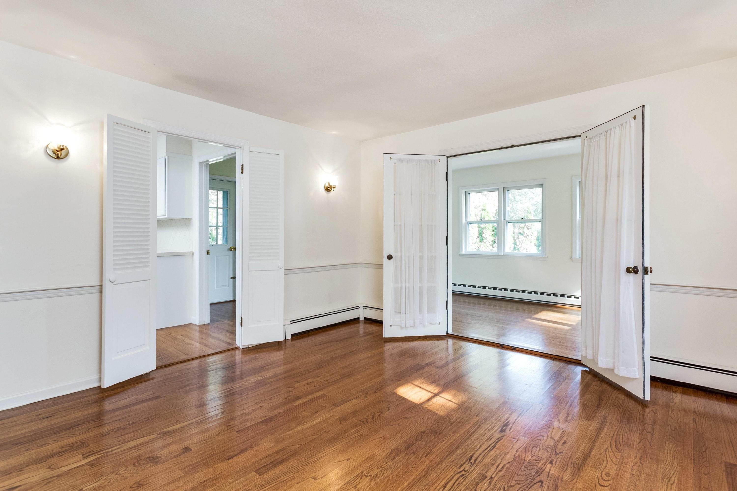 1 Wilson Ridge Road Darien, CT 06820 - Photo 5 of 22 wooden floor in an empty room with a window