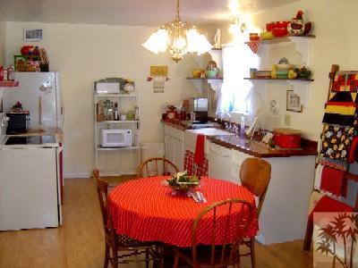 53835 Tollgate Road Idyllwild, CA 92549 - Photo 6 of 11 a view of a dining room with furniture and chandelier